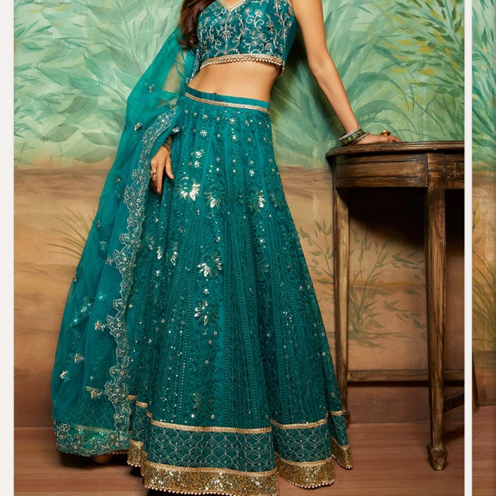 Teal Heavy Thread Embroidered Lehenga from Lashkaraa Size XL  worn once